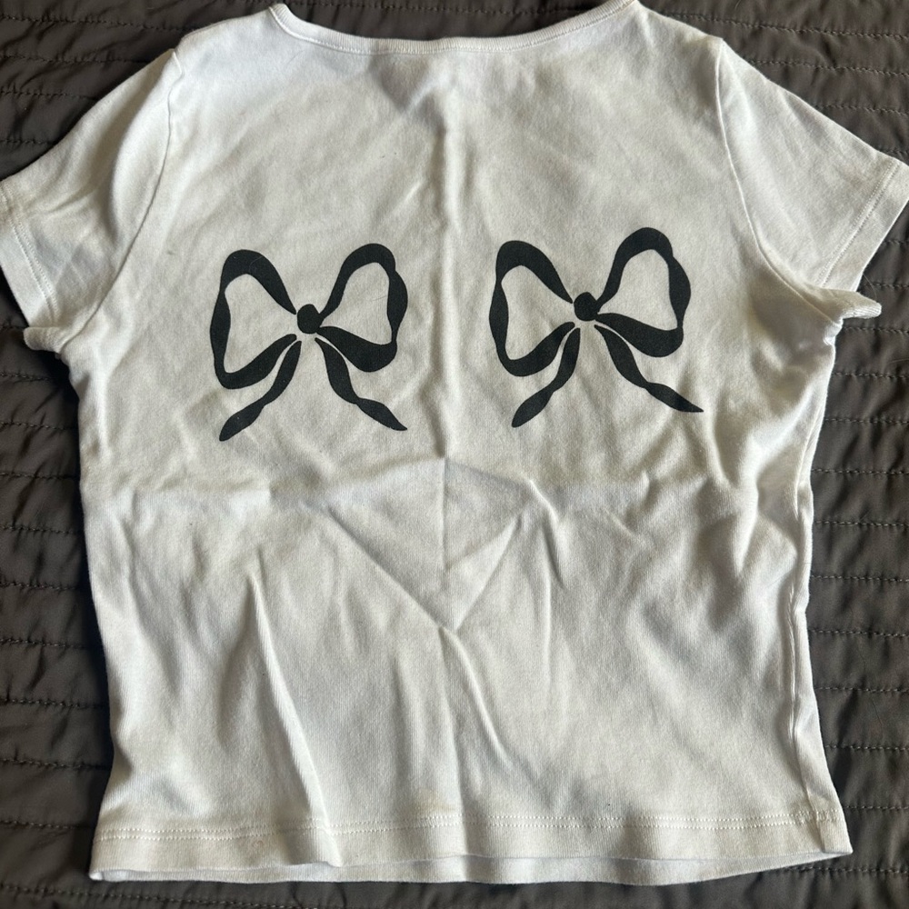 Lisa Says Gah White Tee with Black Bow Graphics